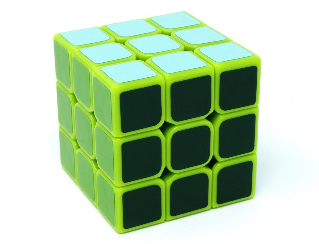 Fellow Cube Green em ângulo aberto destacando o mecanismo e as peças coloridas em verde