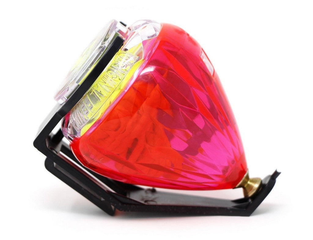Pião Fênix Diamante Rosa em policarbonato com relevo interno e bico de aço — vista frontal