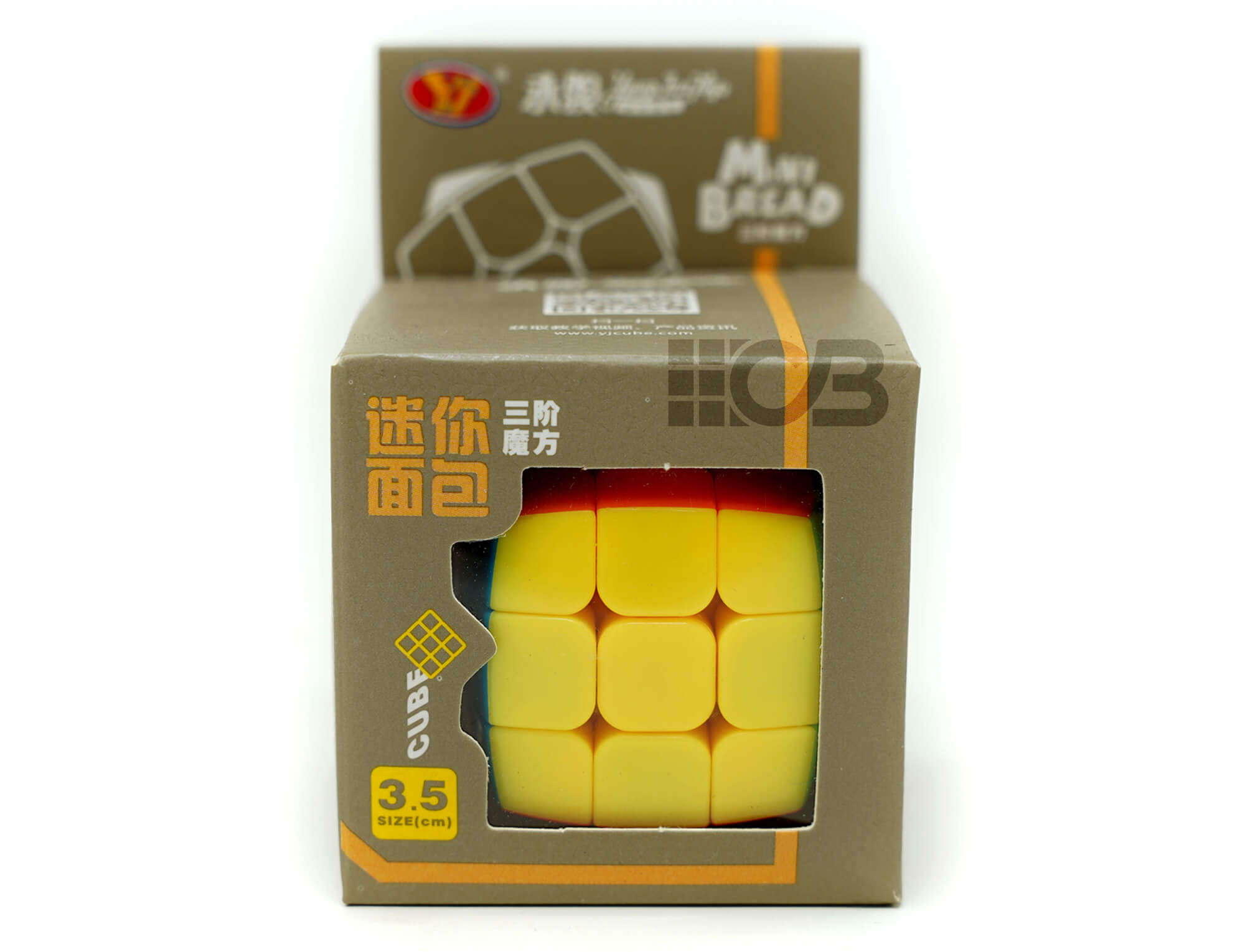 Cubo Mágico chaveiro YJ 3x3 na mão mostrando o tamanho compacto