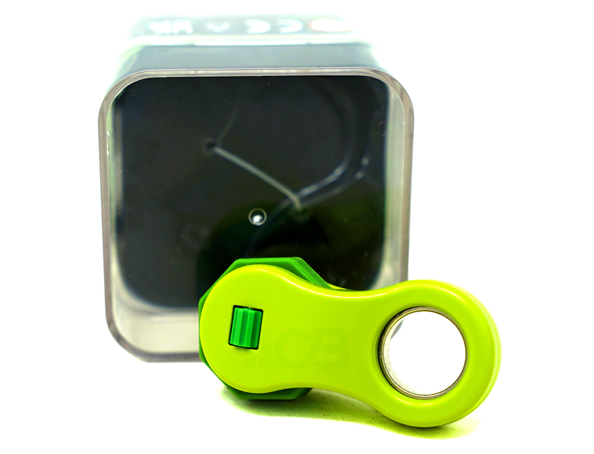 Fidget Roller QiYi verde com embalagem de acrílico ao lado