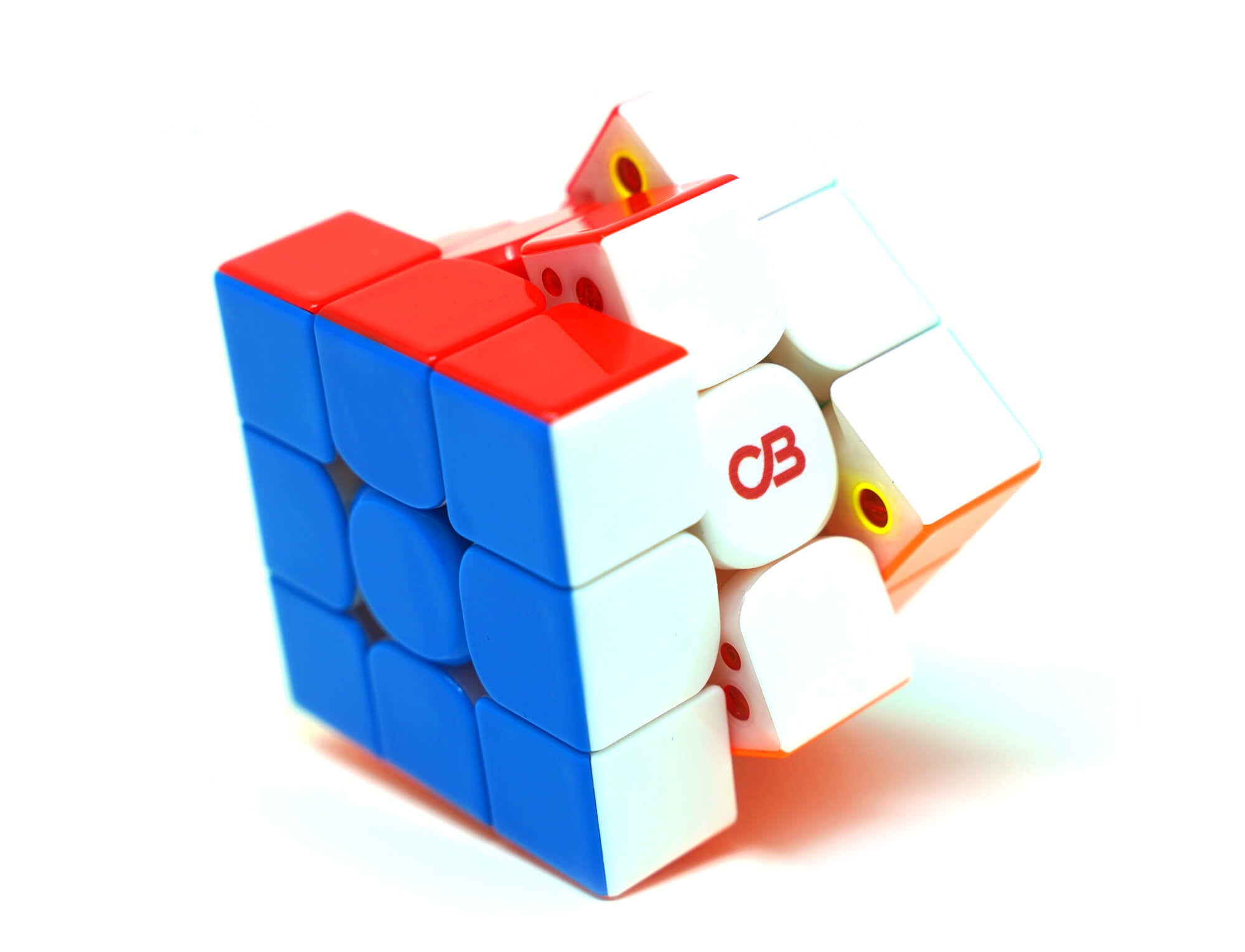 Cubo Mágico Tornado V4 Pioneer ao lado dos lubes Gold e Vita inclusos no kit Cuber Pro