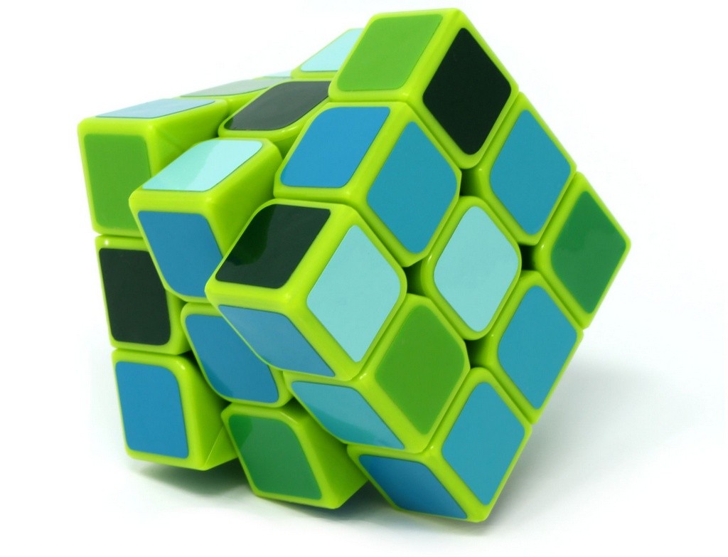 Detalhe lateral do Fellow Cube Green mostrando o padrão monocromático de cores