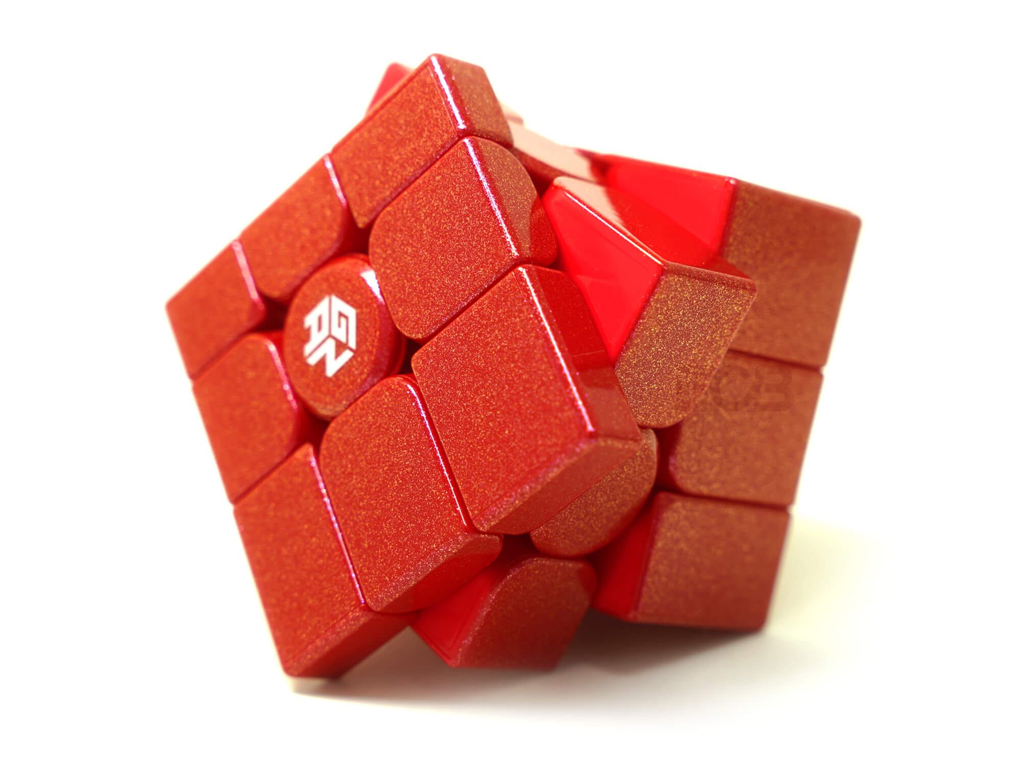 Detalhe do acabamento vermelho UV do Mirror Blocks GAN com reflexo metálico